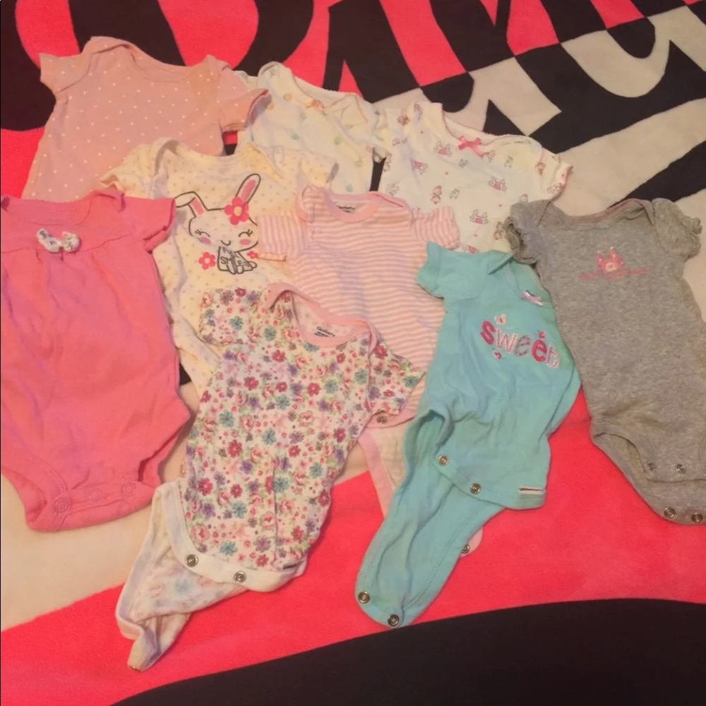 lot of newborn onesies